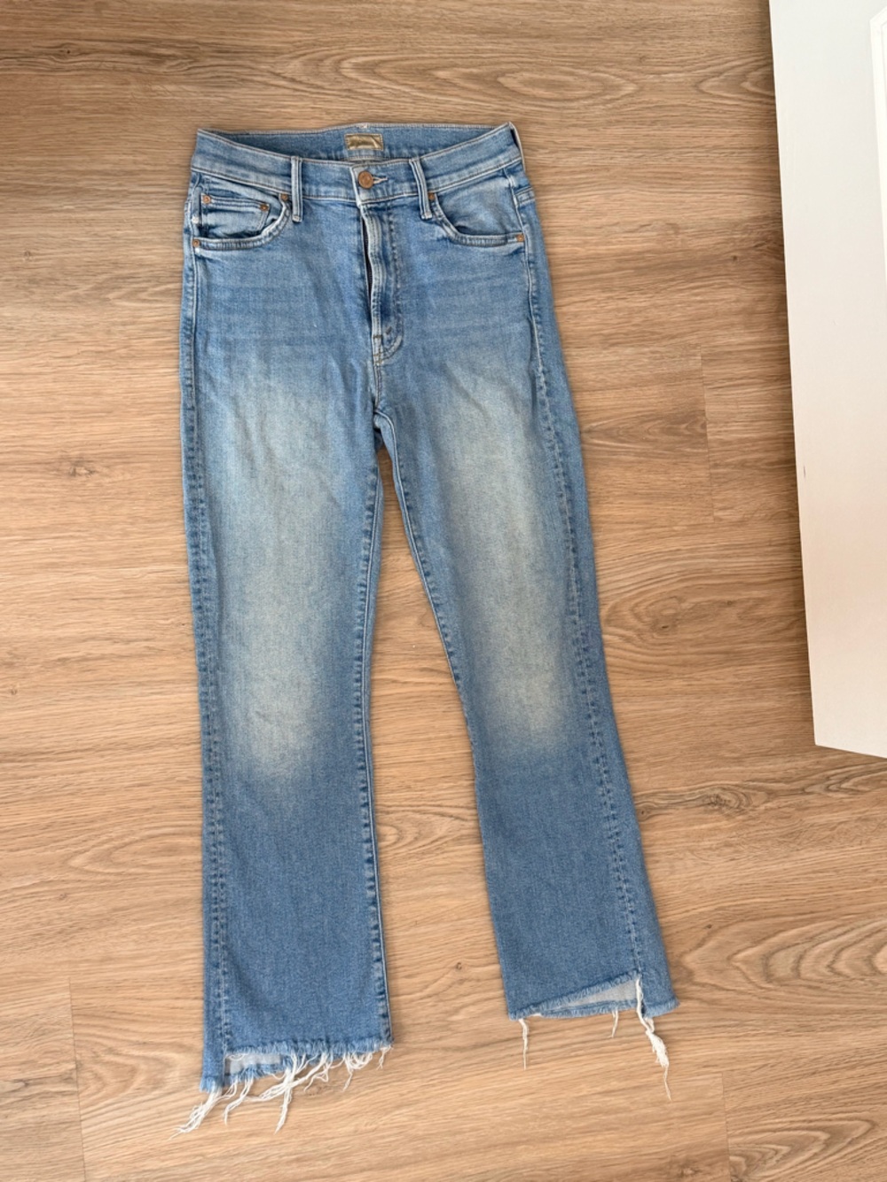MOTHER Light Wash Blue Raw Hem Jeans